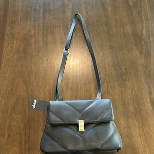 Small black cross body from nasty gal . Tags on
